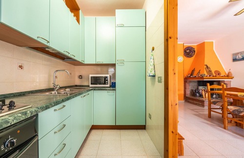 Chia House | Holiday Home 'Casa Al Mare Chia' with Mountain View, Terrace and Air Conditioning