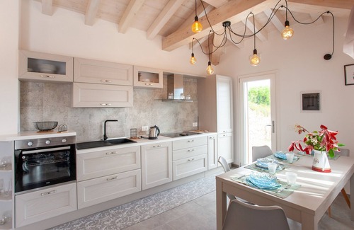 Baia Sant'Anna House | Holiday Home 'Casa Bella Vista' with Sea View, Garden, Terrace & Wi-Fi