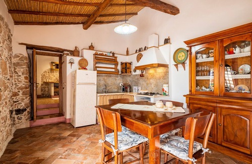 Baunei House | Holiday Home 'Casa Della Nonna Nel Borgo' with Mountain View, Private Garden and Wi-Fi