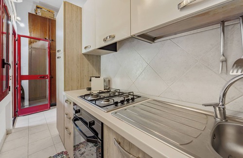 Portoscuso House | Holiday Home 'Casa Di Rita' with Shared Pool, Private Terrace and Air Conditioning