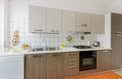 Magomadas House | Holiday Home 'Casa Sole Luna Magomadas' with Private Garden, Balcony and Wi-Fi