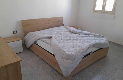 Portoscuso House | Holiday Home 'Casa Vacanze GG 11' with Sea View, Garden & A/C