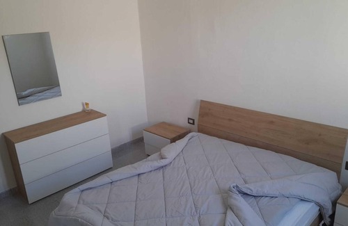 Portoscuso House | Holiday Home 'Casa Vacanze GG 11' with Sea View, Garden & A/C