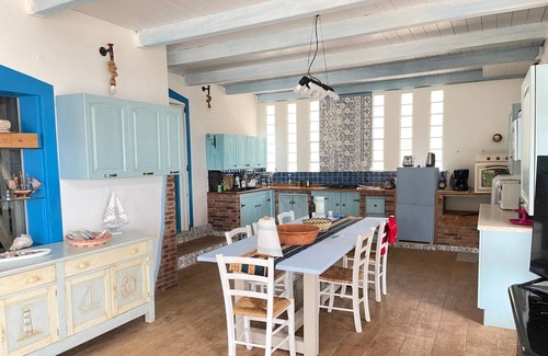 Sant'Antioco House | Holiday Home 'Cottage Turri' with Sea View, Wi-Fi and Air Conditioning