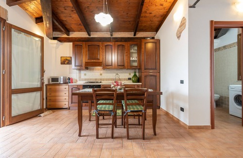 Sant'Antioco House | Holiday Home "Dependance Dei Ginepri" with Sea View, Terrace & Wi-Fi