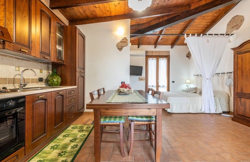 Sant'Antioco House | Holiday Home "Dependance Dei Ginepri" with Sea View, Terrace & Wi-Fi