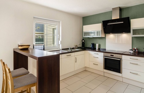 Wiesmoor House | Holiday Home 'Ferienhaus Wiesmoor' with Private Terrace, Private Garden and Wi-Fi