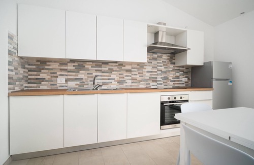 La Caletta House | Holiday Home 'Girasole' with Sea View, Private Terrace and Air Conditioning