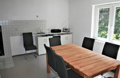 Am Bach House | Holiday Home 'Haus Am Waldrand' with Mountain View, Private Terrace and Wi-Fi