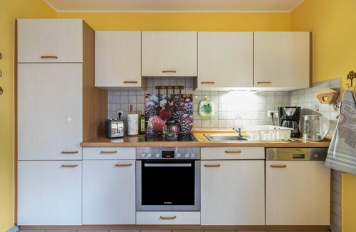 Niebuell House | Holiday Home 'Haus Deichbrise' with Private Terrace, Private Garden and Wi-Fi