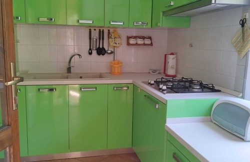 Buggerru House | Holiday Home 'Il Glicine' with Private Terrace, Private Garden and Air Conditioning
