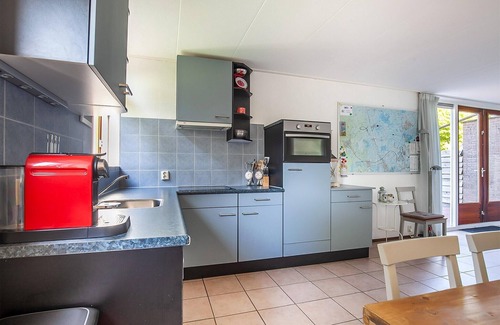 Grou House | Holiday Home in Grou with Whirlpool & Terrace