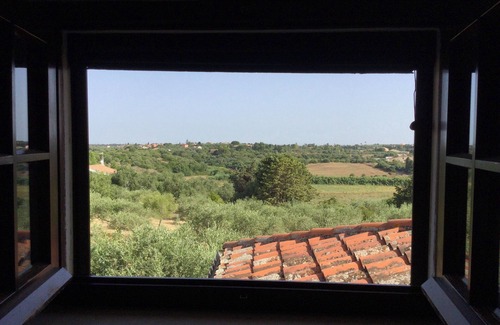 Sassari House | Holiday home in the countryside with a swimming pool, surrounded by greenery.