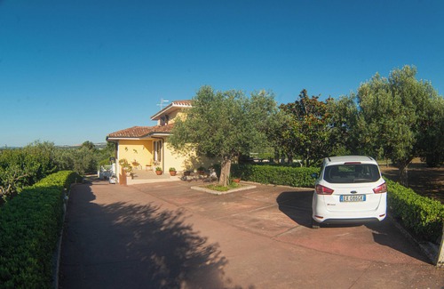 Sassari House | Holiday home in the countryside with a swimming pool, surrounded by greenery.
