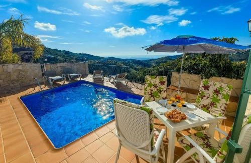 Frigiliana House | Holiday Home La Era by Interhome