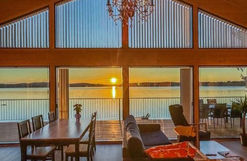 Nurmes House | Holiday Home Lakeside villa by Interhome