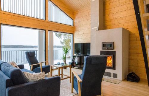 Nurmes House | Holiday Home Lakeside villa by Interhome