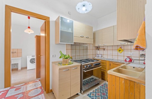 Fluminimaggiore House | Holiday Home 'Orchidea' with Private Terrace, Wi-Fi and Air Conditioning
