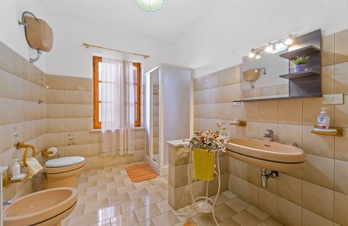 Fluminimaggiore House | Holiday Home 'Orchidea' with Private Terrace, Wi-Fi and Air Conditioning