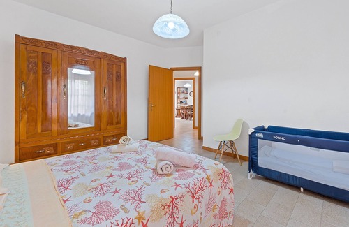 Fluminimaggiore House | Holiday Home 'Orchidea' with Private Terrace, Wi-Fi and Air Conditioning