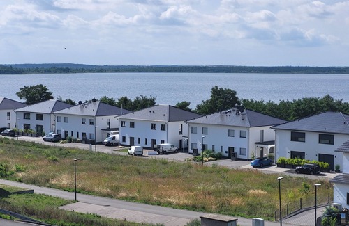 Pouch House | Holiday Home 'Schlossterrassen 8b' with Lake View, Private Terrace and Wi-Fi