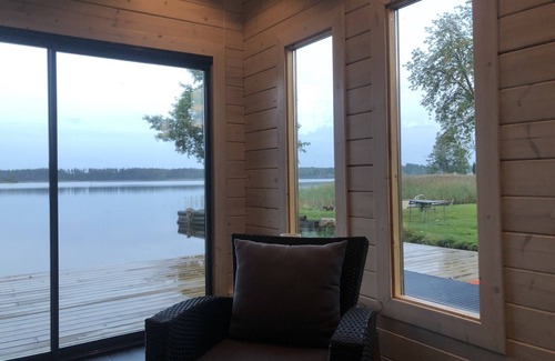 Lockna Cottage | Holiday home Sweden by the lake bolmen with sauna, fireplace and boat