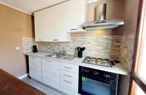 Notteri House | Holiday Home 'Villa Le Vele A' with Sea View, Private Terrace and Air Conditioning