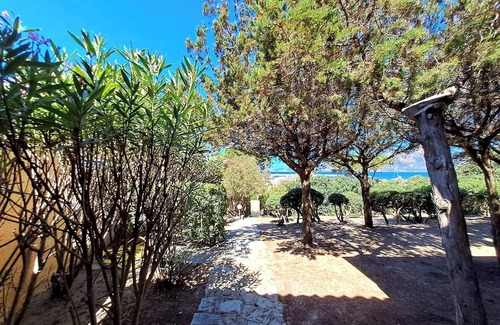Notteri House | Holiday Home 'Villa Le Vele A' with Sea View, Private Terrace and Air Conditioning
