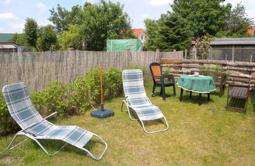 Rambin House | Holiday home with fireplace and barbecue in the garden