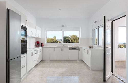 Kalathos House | Holiday house Archangelos for 1 - 19 persons with 9 bedrooms - Holiday home