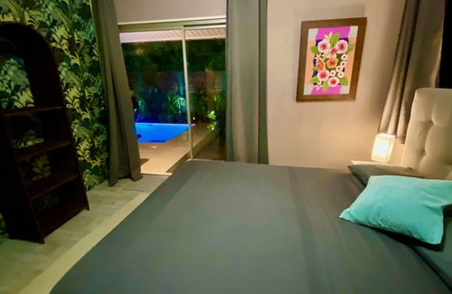 Punaauia House | Holiday house with private pool, near the beach with an exotic garden