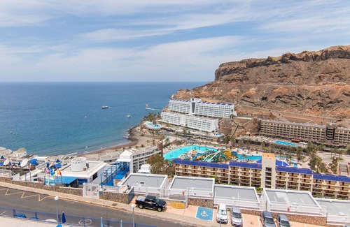 Taurito Apartment | Holidays 'Stunning Sunset Ocean View' with Sea Views, Shared Pool and Wi-Fi