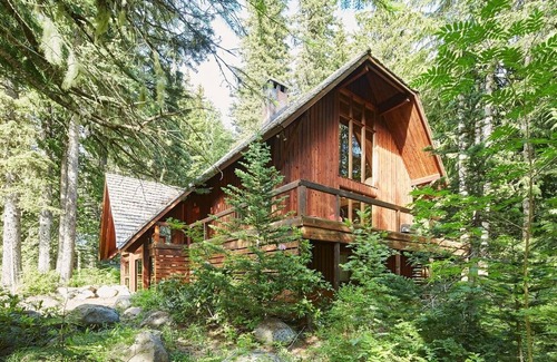 Government Camp Cabin | Holzhutte, a mid-century modern cabin with historic and modern touches