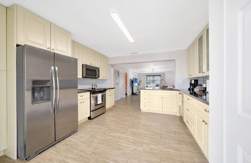 Melaleuca Gardens House | Home on Canal unit A by PMI