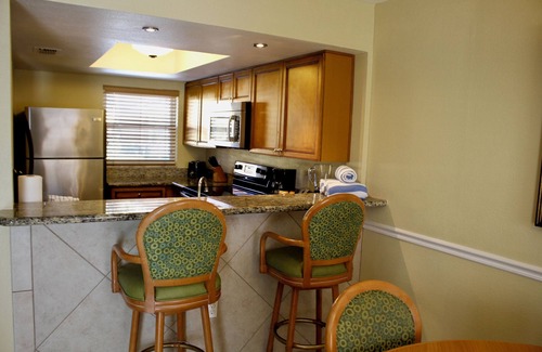 Kissimmee Apartment | Home-Style Comfort | Family Fun | Explore Orlando’s Magic | Kitchen | Pool