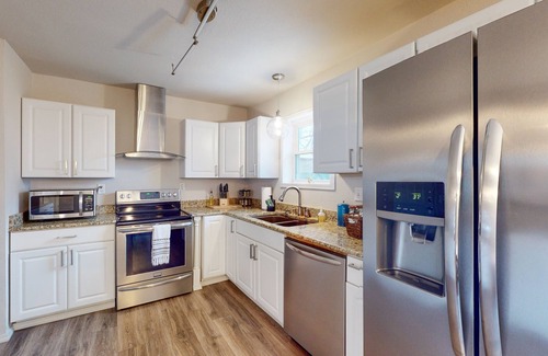 Downtown House | Home with a hot tub, enclosed yard, washer/dryer, central AC & cable