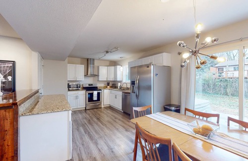 Downtown House | Home with a hot tub, enclosed yard, washer/dryer, central AC & cable