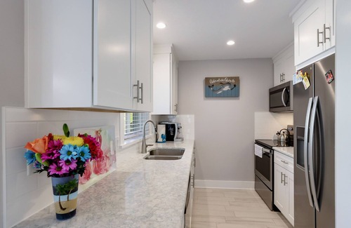 Holmes Beach Cottage | Home with Private Pool, Two Blocks from the Beach! - Queen Palms