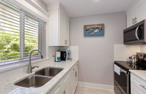 Holmes Beach Cottage | Home with Private Pool, Two Blocks from the Beach! - Queen Palms