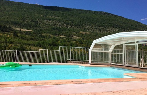 La Roche-sur-le-Buis Apartment | Homerez - Apartment for 6 people with shared pool, garden and terrace