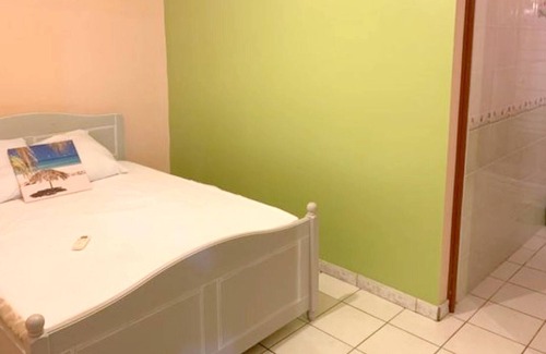 Ducos Apartment | Homerez - Appartement 13 km away from the beach for 4 ppl. with garden at Ducos