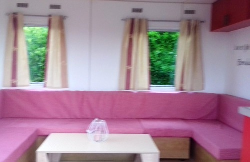 Sainte-Marie-du-Mont House | Homerez - Bungalow for 4 ppl. with garden and terrace at Sainte-Marie-du-Mont