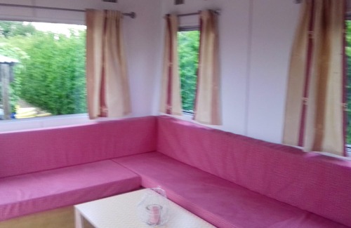 Sainte-Marie-du-Mont House | Homerez - Bungalow for 4 ppl. with garden and terrace at Sainte-Marie-du-Mont