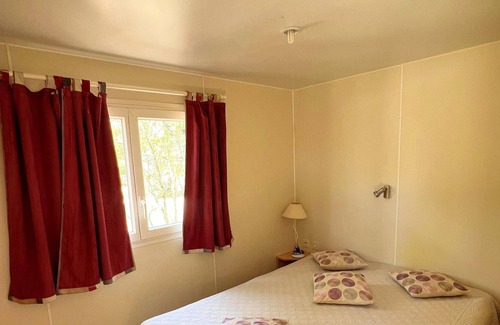 Mejannes-le-Clap House | Homerez - Bungalow for 6 ppl. with shared pool and terrace at Méjannes-le-Clap