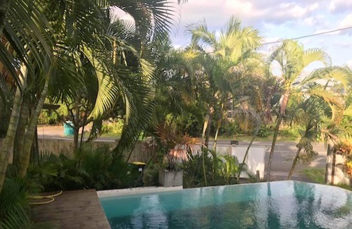 Manapany-les-Bains House | Homerez - House 1 km away from the beach with shared pool, jacuzzi and garden