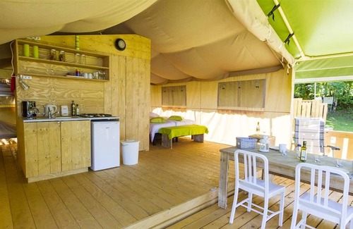 Banes House | Homerez - Property for 4 ppl. with shared pool and terrace at Argences-en-Aubrac