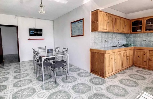 Calodyne Apartment | Homerez - Spacious Apartment in Calodyne with Enclosed Garden