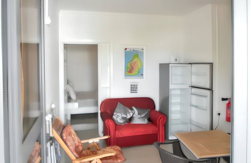 Mont Choisy Apartment | Homerez - Studio in Trou-aux-Biches, garden view.