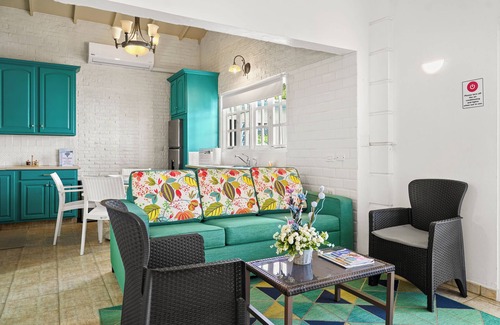 Koyari Apartment | Homey 2-bdrm Apartment with Pool and Garden, 5 min to Eagle Beach and Palm Beach