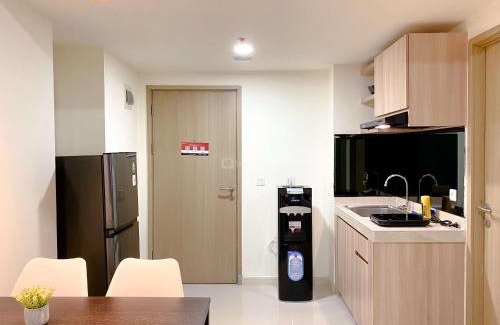 Cikarang Apartment | Homey 2BR with Work Space at Meikarta Apartment By Travelio